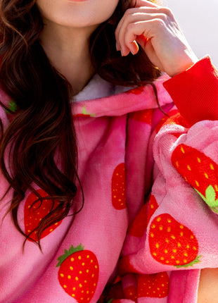 Coperta con cappuccio alla fragola